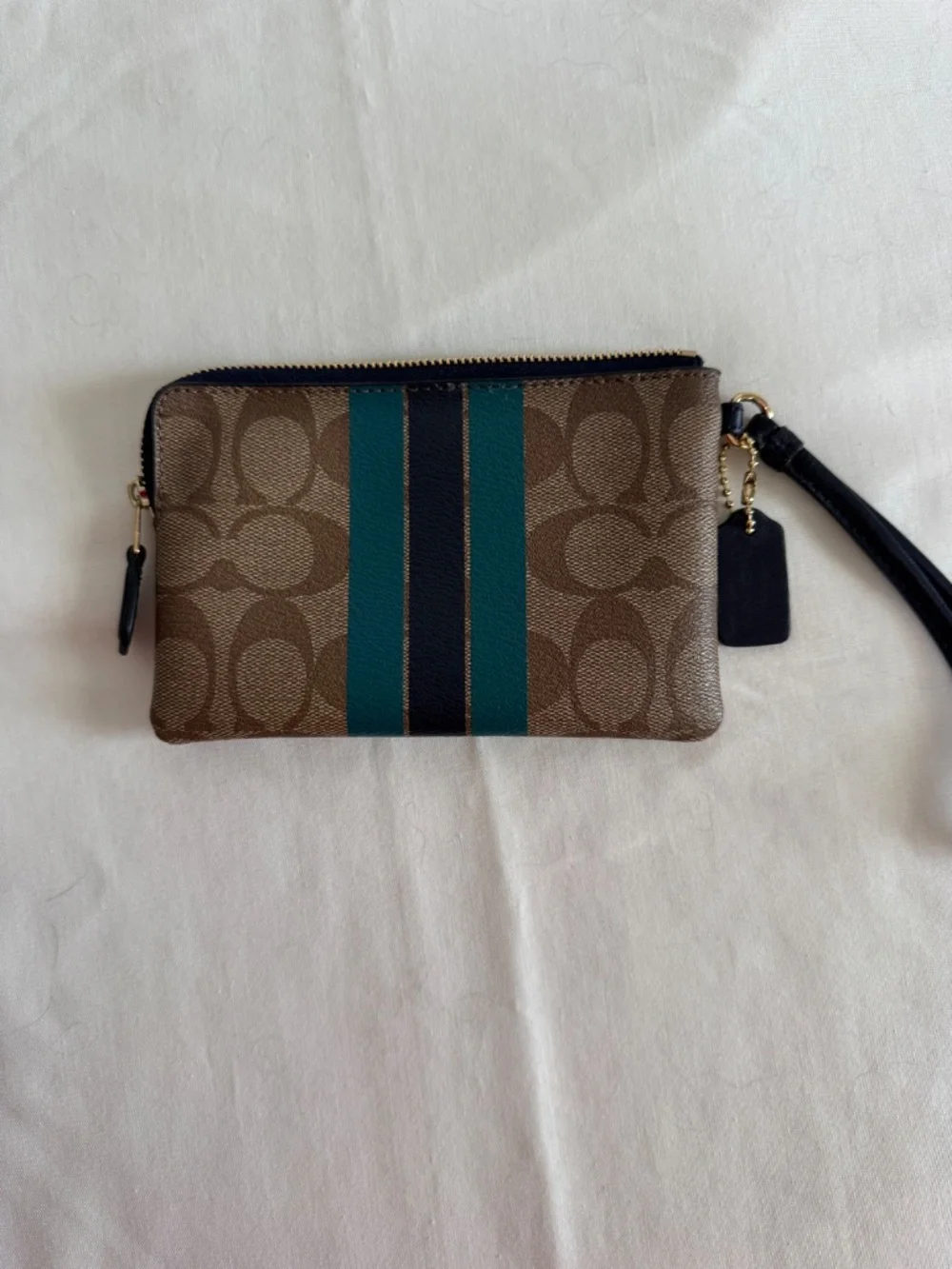 Coach Wristlet Tan/Brown monogram with teal and blue stripes and navy blue strap - Picture 2 of 7